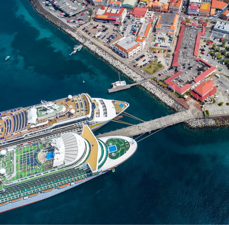 Cruise ships docked on a dock in the caribbean